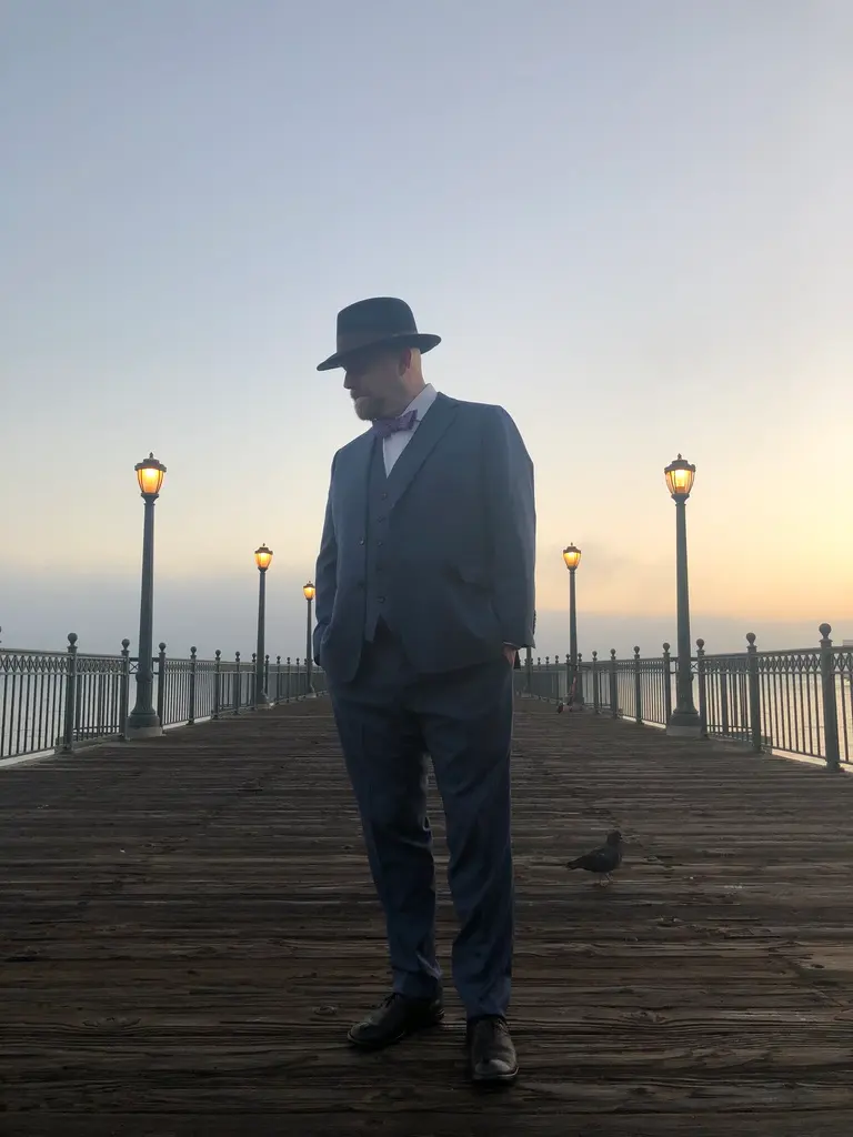 Kent on Pier 47 in San Francisco looking pensive. Photo credit Robert Opiyo